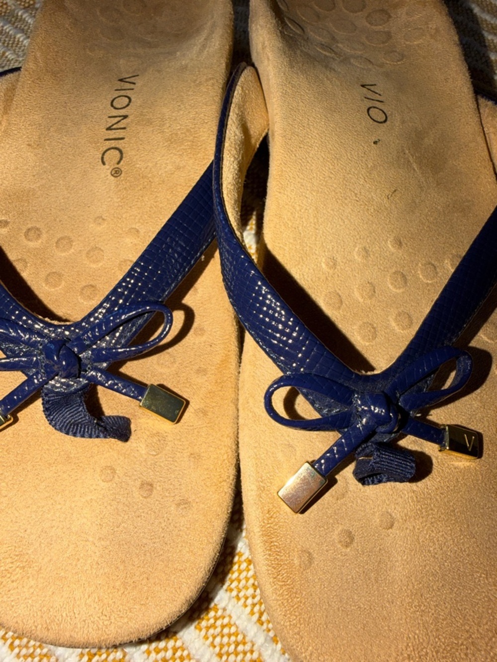 Vionic Navy Bow Thong Sandals for Women with Gold Accents - Picture 6 of 8